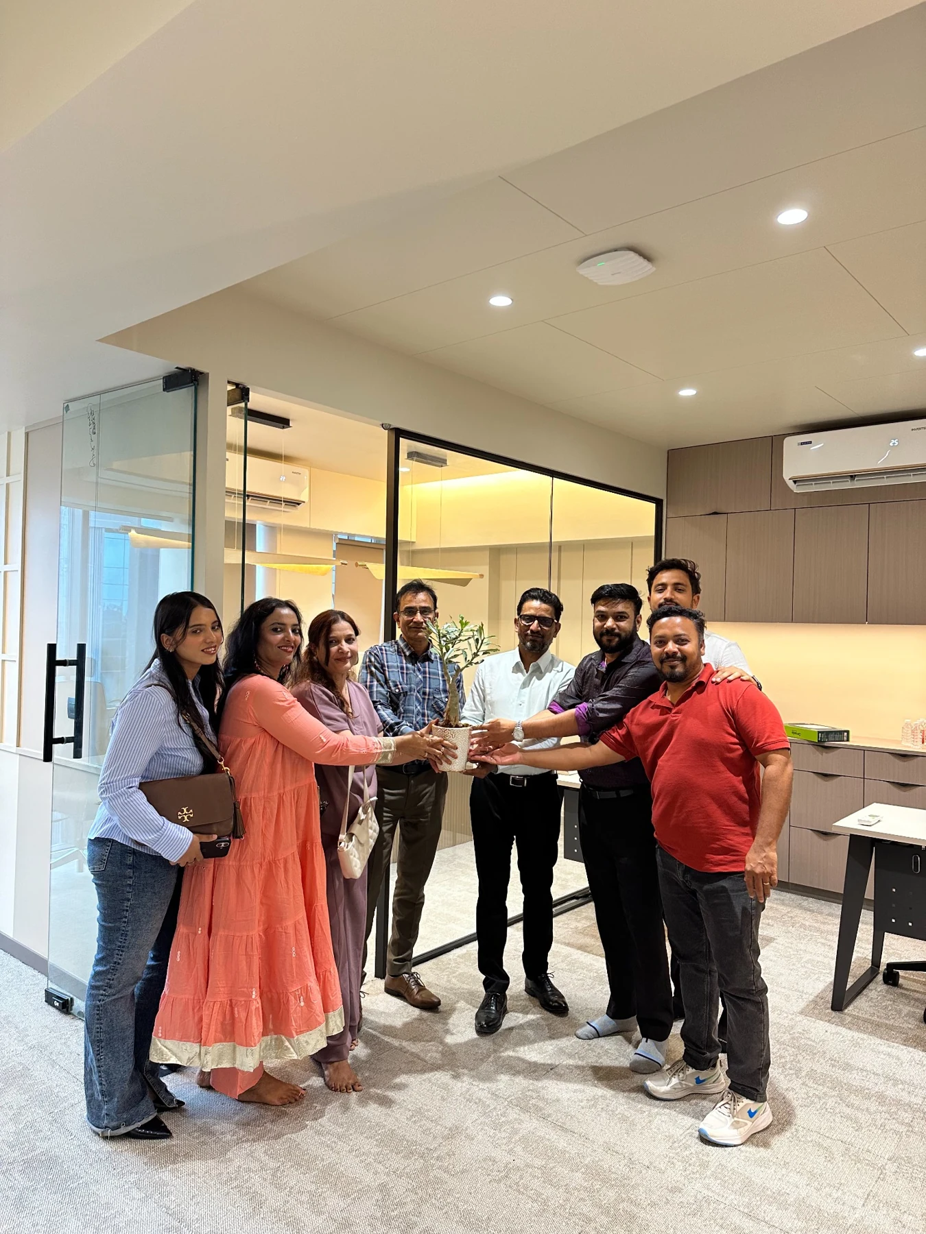 Team marking a new chapter in the new office